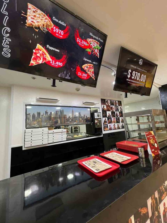 Abre el primer local de pizzas a un dólar en patronato