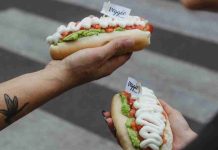 Dominó convierte la meta en una fiesta: Runners podrán celebrar con completos la Maratón de Santiago